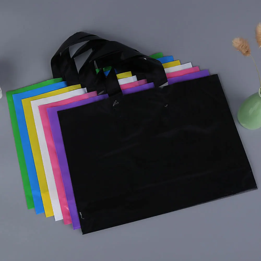 

10PCS/LOT Plastic Shopping Bag Packaging Party Gift Bags Large Gift Plastic Bag with Handle Clothes Storage Bag 25x20cm