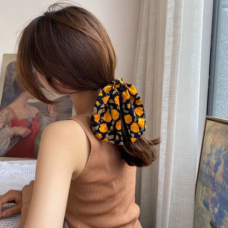 

Tied hair holster floral hair rope headdress autumn and winter girl Korean streamer hair ring head rope simple hair tie