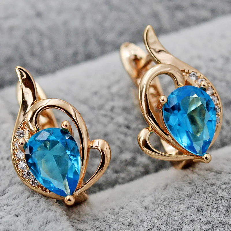 Роскошные женские серьги кольца из белого золота с радужным цирконием красочные