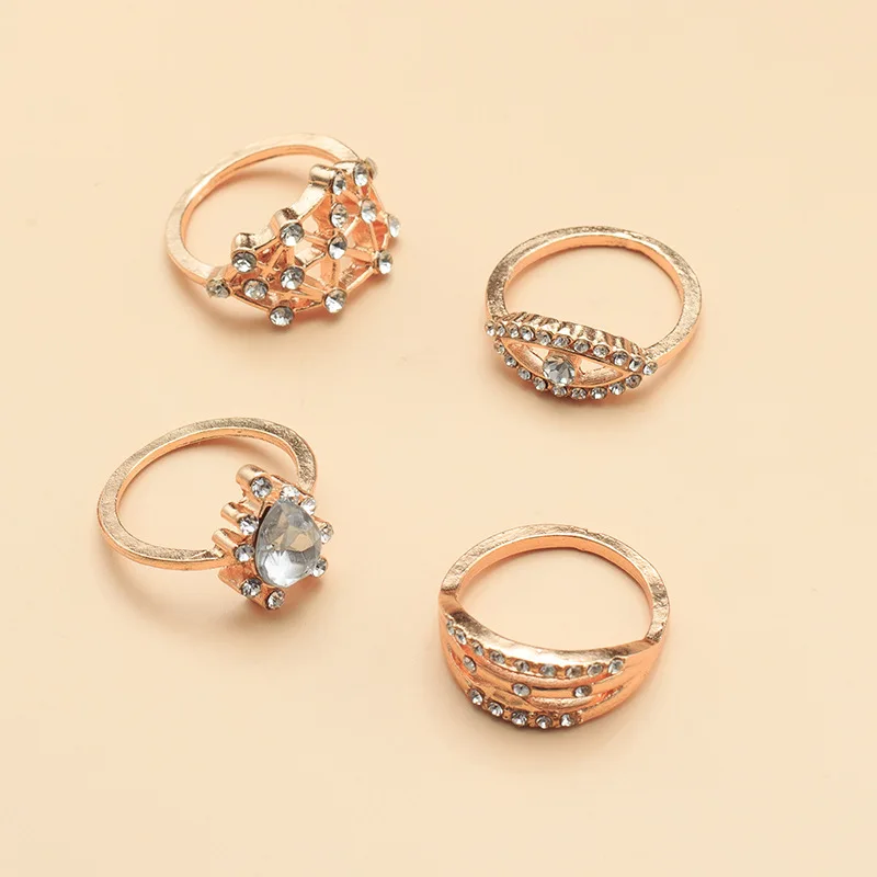 

4pcs/set Bohemia Vintage Gold Metal Eyes Diamond Hollow Rings Set for Women Punk Personality Party Accessorie Women Ring Jewelry