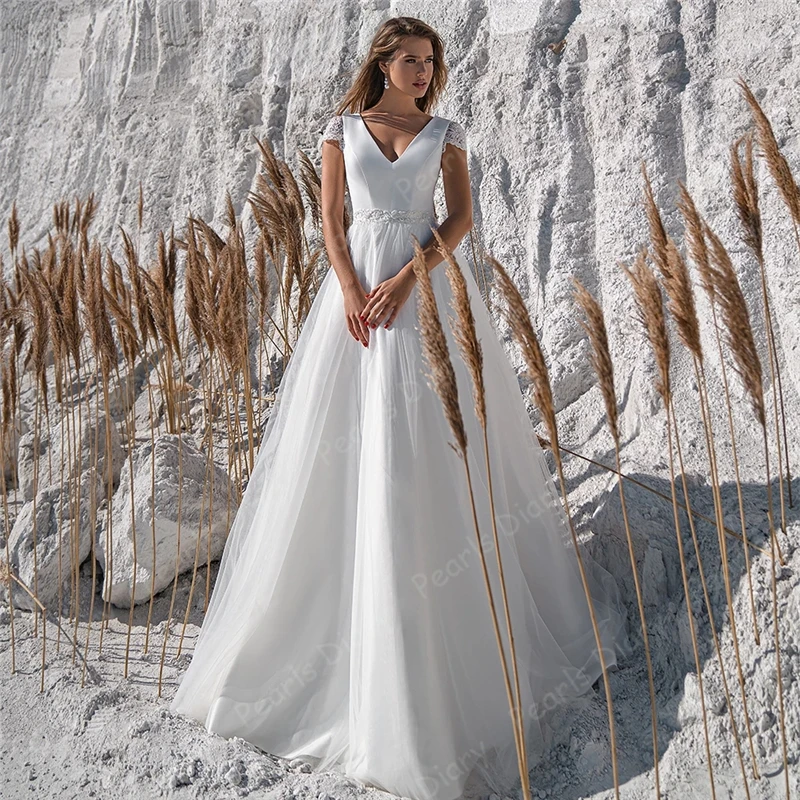 

Уникальное Пляжное длинное свадебное платье, свадебное платье 2020 с V-образным вырезом, бисером и поясом, кружевное цельное Тюлевое ТРАПЕЦИЕ...