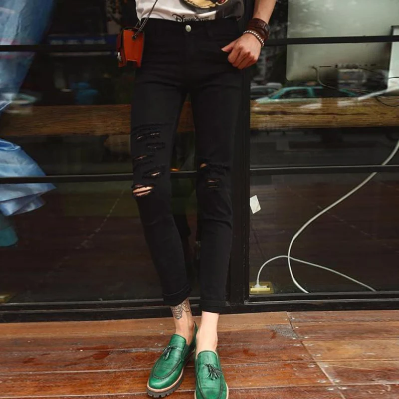 Мужские джинсы с вырезами на коленях черные в европейском и американском стиле