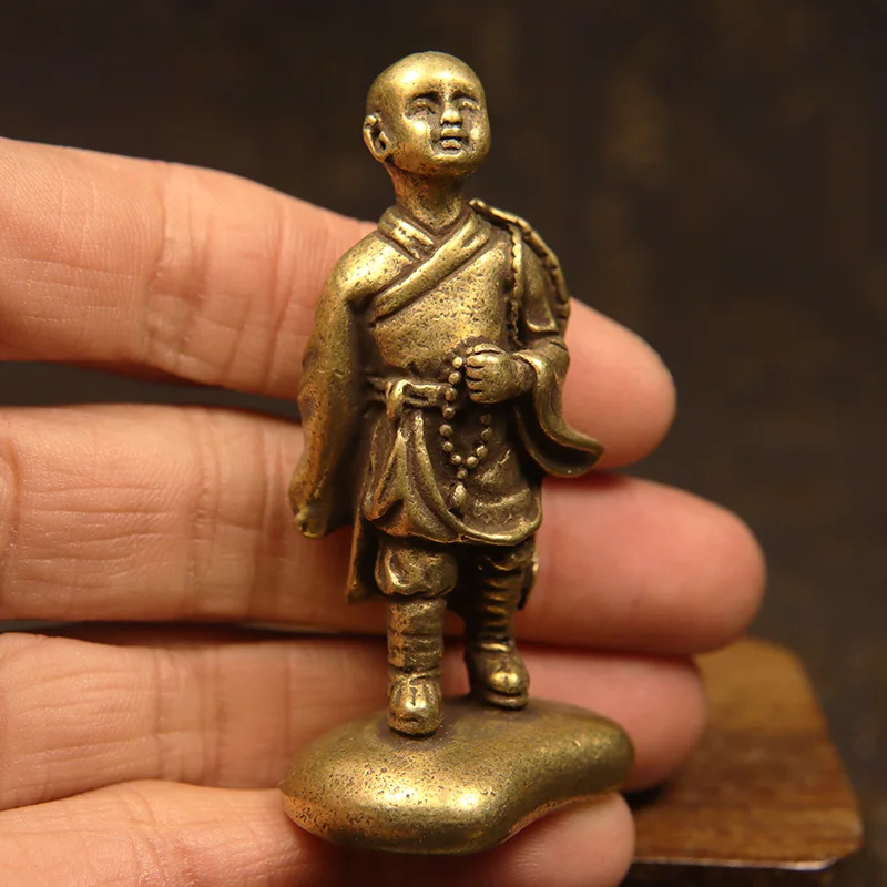 

Бронзовая статуэтка монаха из меди