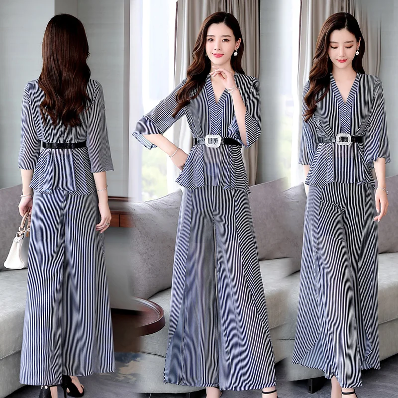 Женский костюм из двух предметов блузка в полоску и брюки с широкими штанинами