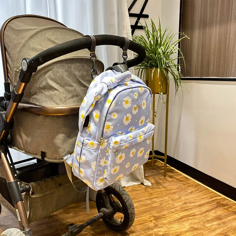 

2021 New Diaper Bag Small Daisy Print Multifunctional Folding Baby Mommy Backpack Portable Large Capacity Nappy Maternity Bag