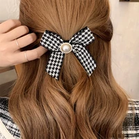 french temperament lady grasping clip bow pearl hairpin ins retro style houndstooth headdress hair rope clip