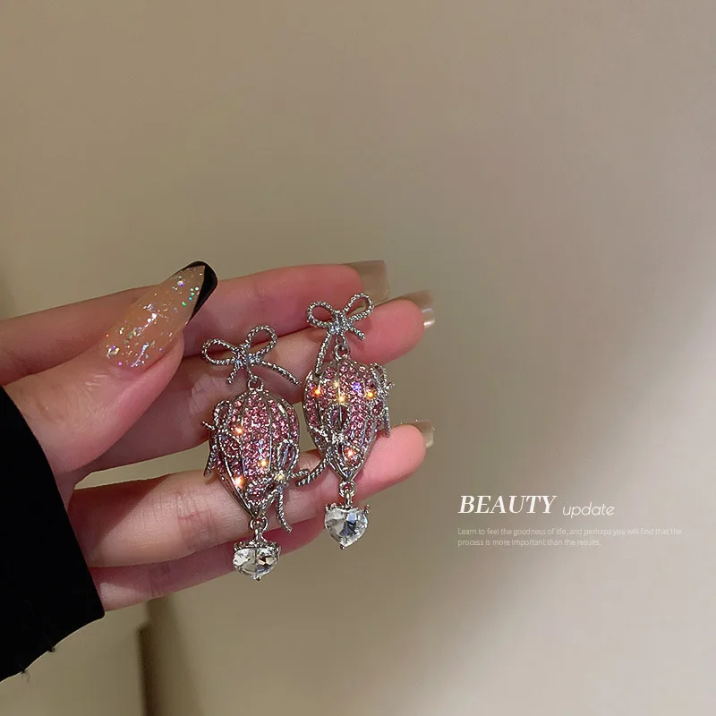 

Fashion Temperament 925 Silver Needle Diamond Melon Seed Bow Fashion Creativity Small Fresh Ins Net Red Earrings