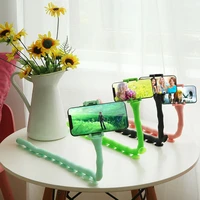 zk20 dropshipping cute caterpillar lazy bracket mobile phone holder worm flexible phone suction cup stand for home wall desktop