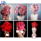 Картина по номерам на холсте Девушка с красными цветами