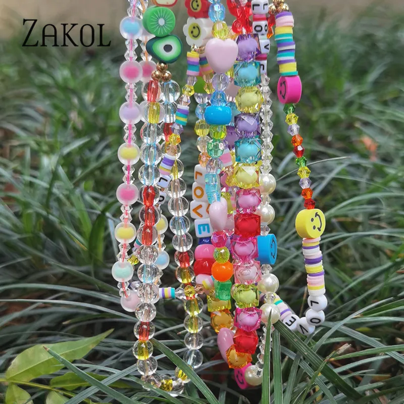 

ZAKOL 2021 New Mobile Phone Strap Lanyard Colorful Smile Pearl Soft Pottery Rope for Cell Phone Case Hanging Cord for Women