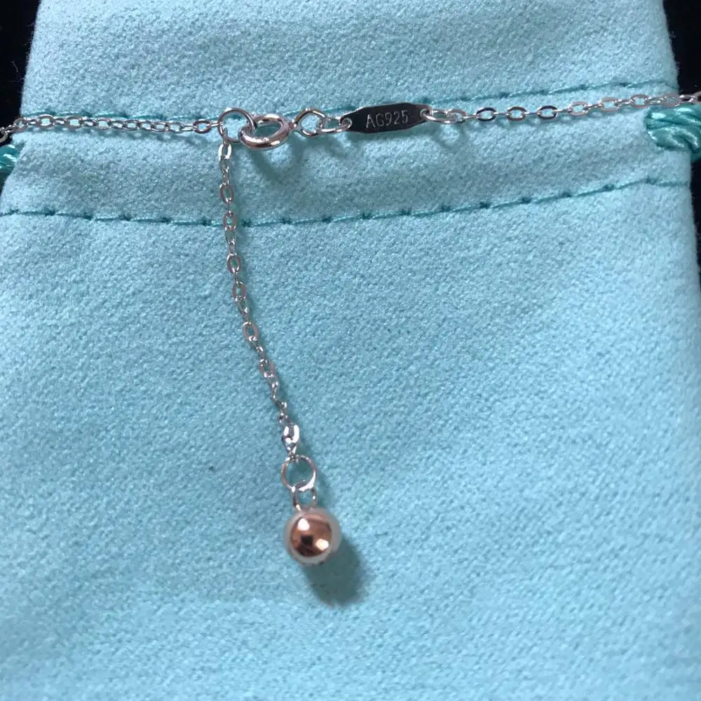 

Sterling Silver Butterfly love necklace. Silver charm and originality. Classic micro tag. 925 Sterling Silver 1:1