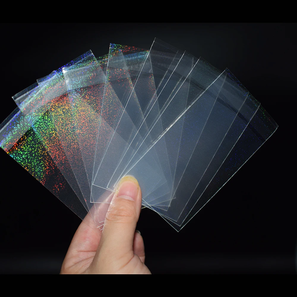 100pcs/lot 57x87mm Quicksand Flash Small Cards Transparent Laser Clear Sleeves Idol Photo Protector Trading Shield Cover | Спорт и