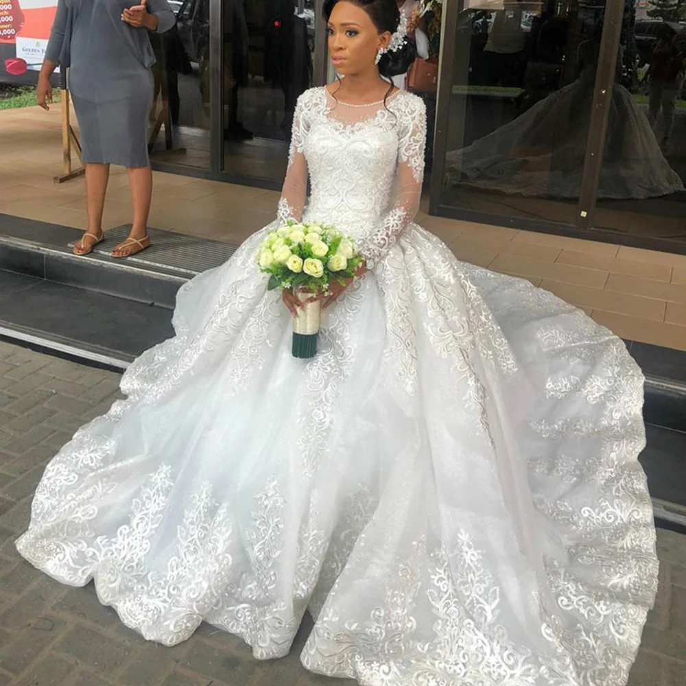 

Sheer Scoop Neck Arabic Dubai Wedding Dresses 2020 Lace Beaded Luxurious Long Sleeves Bridal Dress Ball Gown Wedding Gowns H202