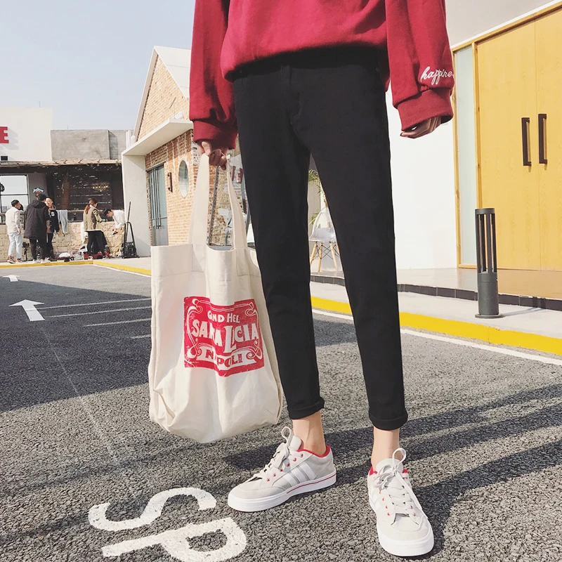 Мужской джинсовый костюм с металлическими кольцами и пряжкой черные зауженные