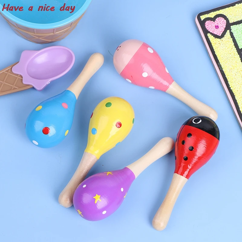 

1PCS Early Education Wooden musical Toy High Quality Sand Hammer Maraca Wood Rattles Kid Baby Shaker Toy Children's Party Favor