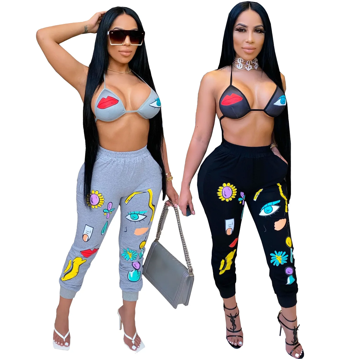 

Женский спортивный костюм из двух предметов: бюстгальтер без рукавов с принтом и брюки