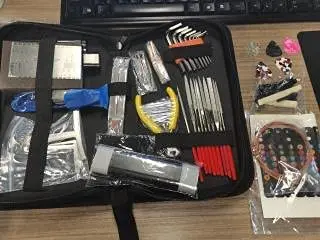 

72 Pcs Guitar Repairing Maintenance Tool Kit Professional Guitar Setup Tool Kit with Case Strings Picks Bridge Pins Gauge Guard