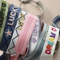2022 european and american popular hand jewelry bohemian national style hand letter embroidery tassel woven bracelet