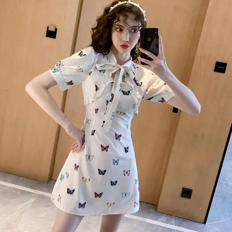 

new arrival fashion summer mini party dress women OL temperament sweet fresh print vintage puff sleeve ruffle bow holiday dress