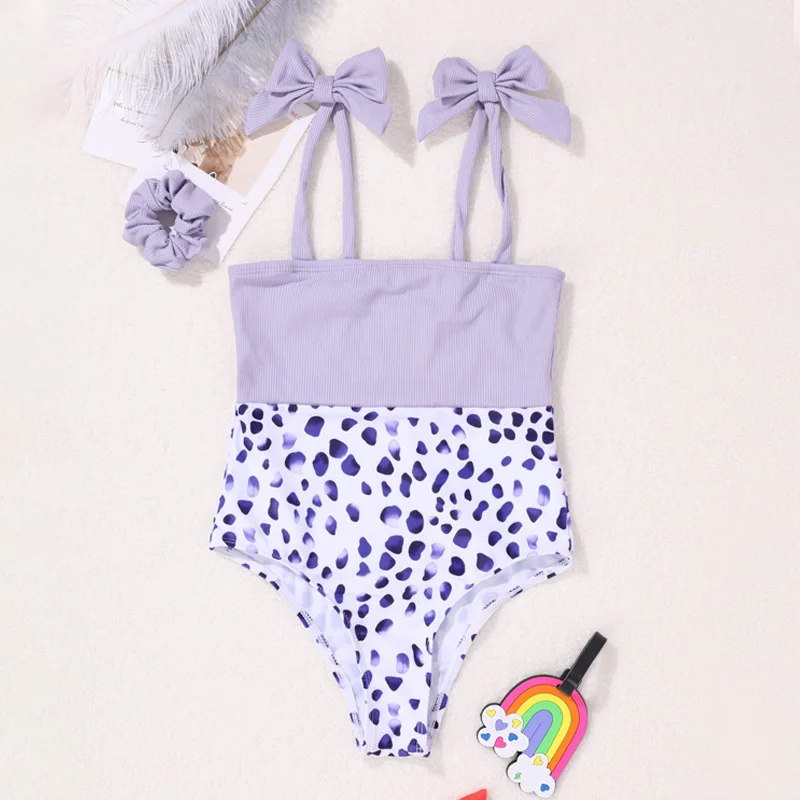 

2021 Children's One-Piece Swimsuit Women's Summer Pure Color Bowknot Double Shoulder Straps Send Head Flower Children's Swimsuit