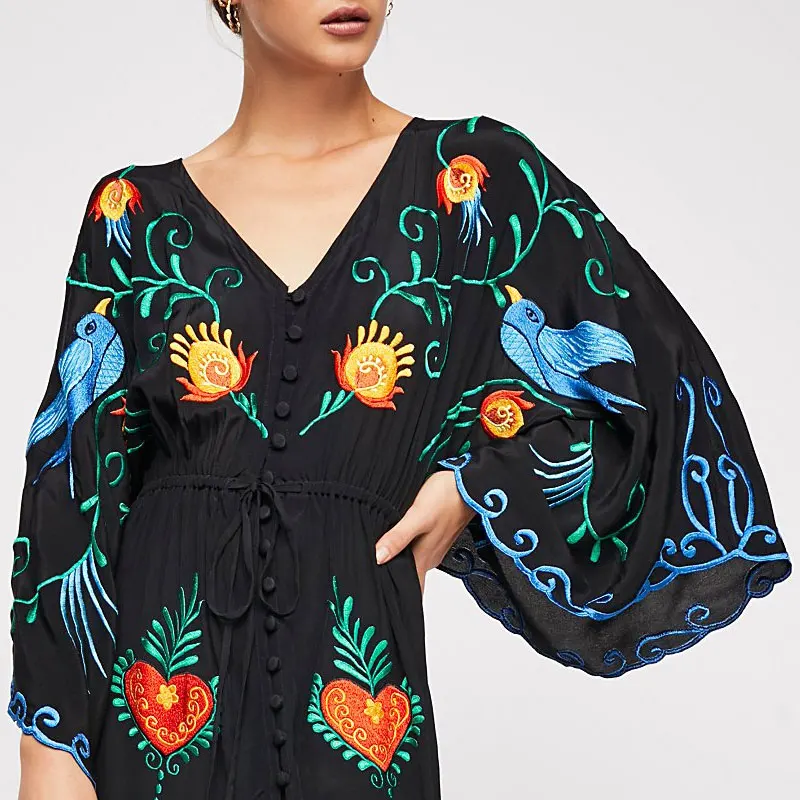 

Summer new Bohemian tourist island resort dress with loose v-neck, retro ethnic embroidered flower dress