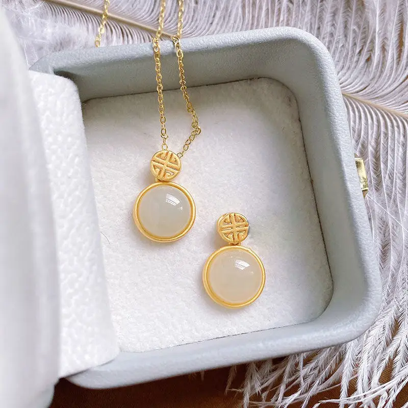 

New silver inlaid natural Hetian white Chalcedony round pendant necklace Chinese palace style niche design women's brand jewelry