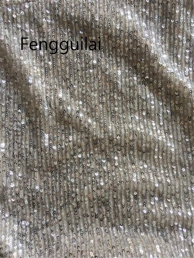 

FENGGUILAI Women Sexy Tassel Sequin Glittering Dress Deep V Long Sleeve Side Slit Asymmetrical Dresses Vestido Sexy De Moda