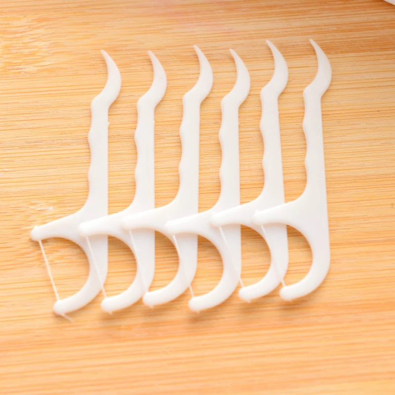 100 шт Пластик зубная нить Stick нейлон провода Портативный уход за зубами