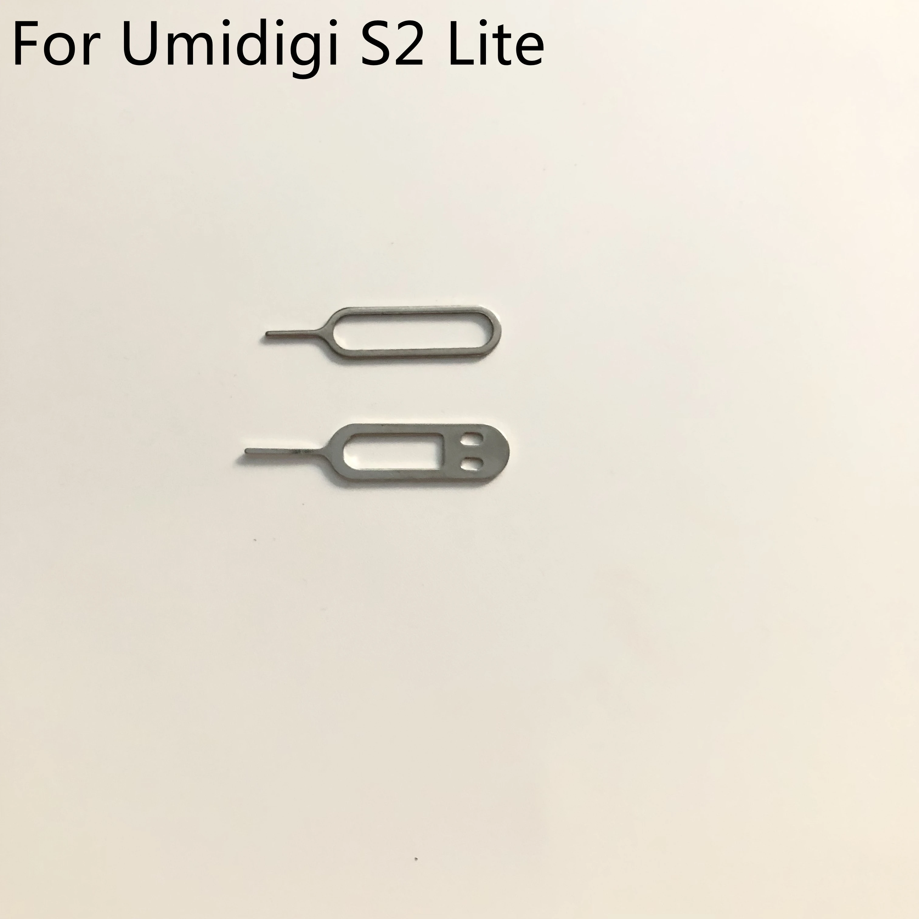 Используется игла для обработки штифта извлечение сим-карты сотового телефона