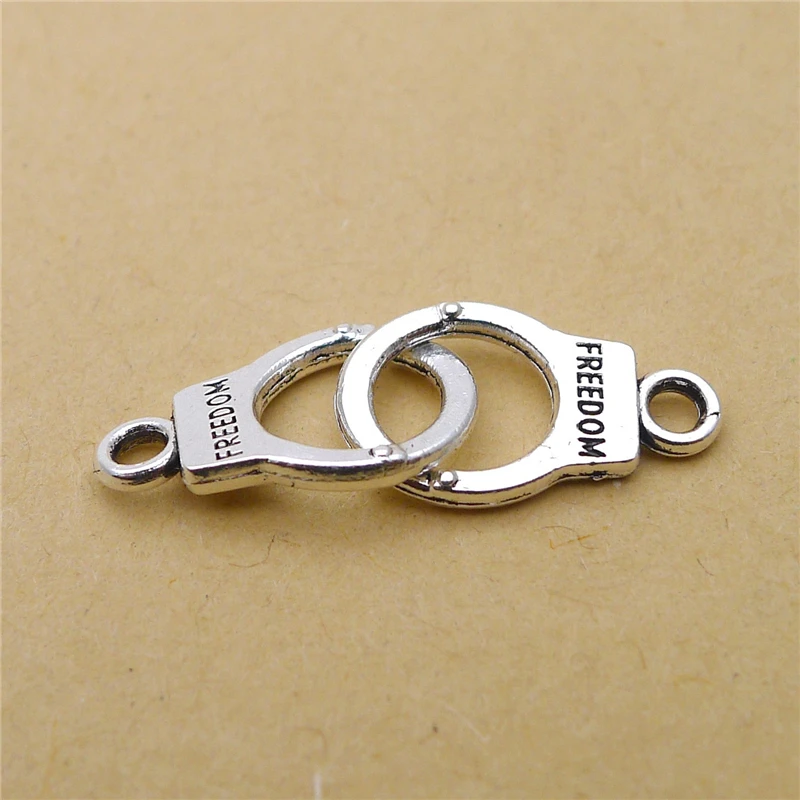 

Oein 20pcs Silver Color Handcuffs Alloy Pendants Hip-hop Style Necklaces Earrings DIY Charms Jewelry Crafts Making 24*10mm
