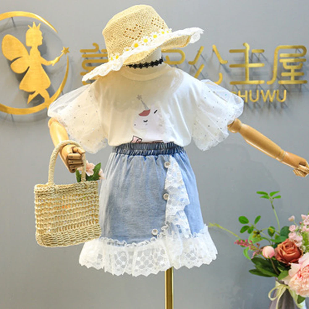 

Children Clothing 2022 Summer Girls Cartoon Puff Sleeve Top + Lace Stitching Denim Skirt Two-piece Set Girls Dresses 2 to 8 Year