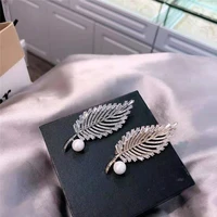 okily beautiful zirconia hollow out leaves brooches pin for women men scarf coat suit corsage brooch with pearl new year gift