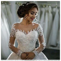 gorgeous sparkling long sleeves wedding dresses zipper back sheer neckline applique with beads crystal bridal gowns