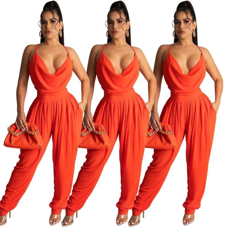 Оранжевые облегающие комбинезоны с глубоким V образным вырезом и открытой спиной