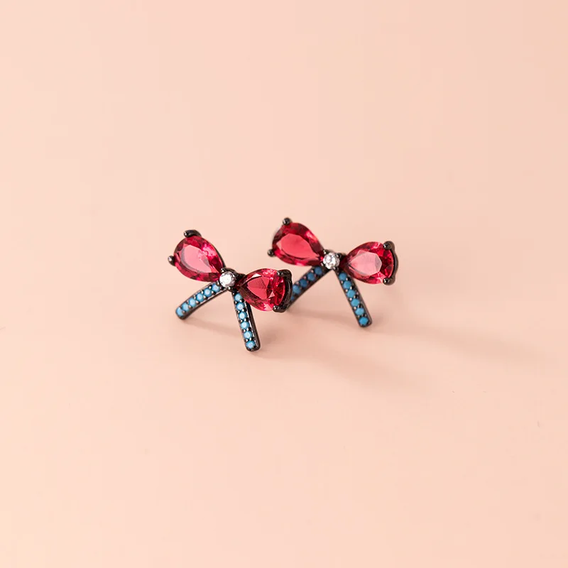 

Женские серьги-гвоздики из серебра 925 пробы с бантом