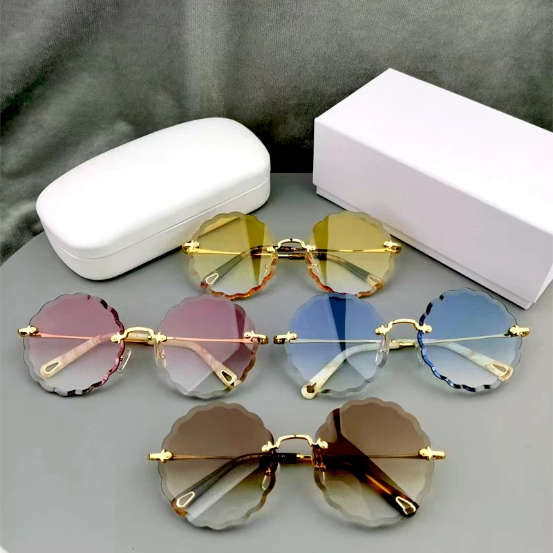 

Pink blue round sunglasses Frameless women's Metal Fashion round sunglasses Women's Gradual change lenses frameless 2021 UV400