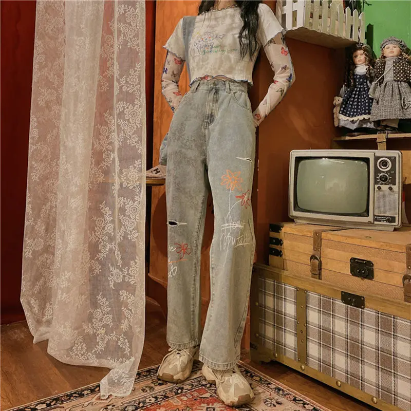 

Printed jeans women's straight tube loose fat mm large size design sense retro personality high waist show thin hole wide leg