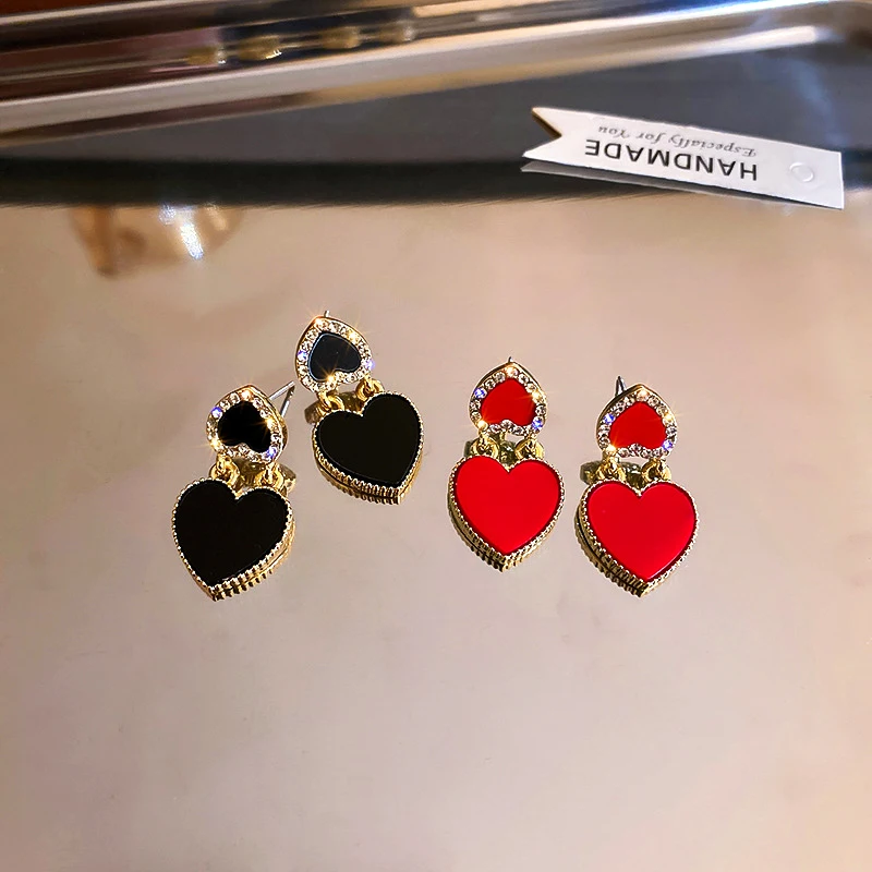 

Женские серьги-подвески в форме сердца, с фианитом