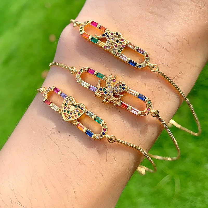 Женский браслет с радужными кристаллами регулируемый золотистый фианитами в