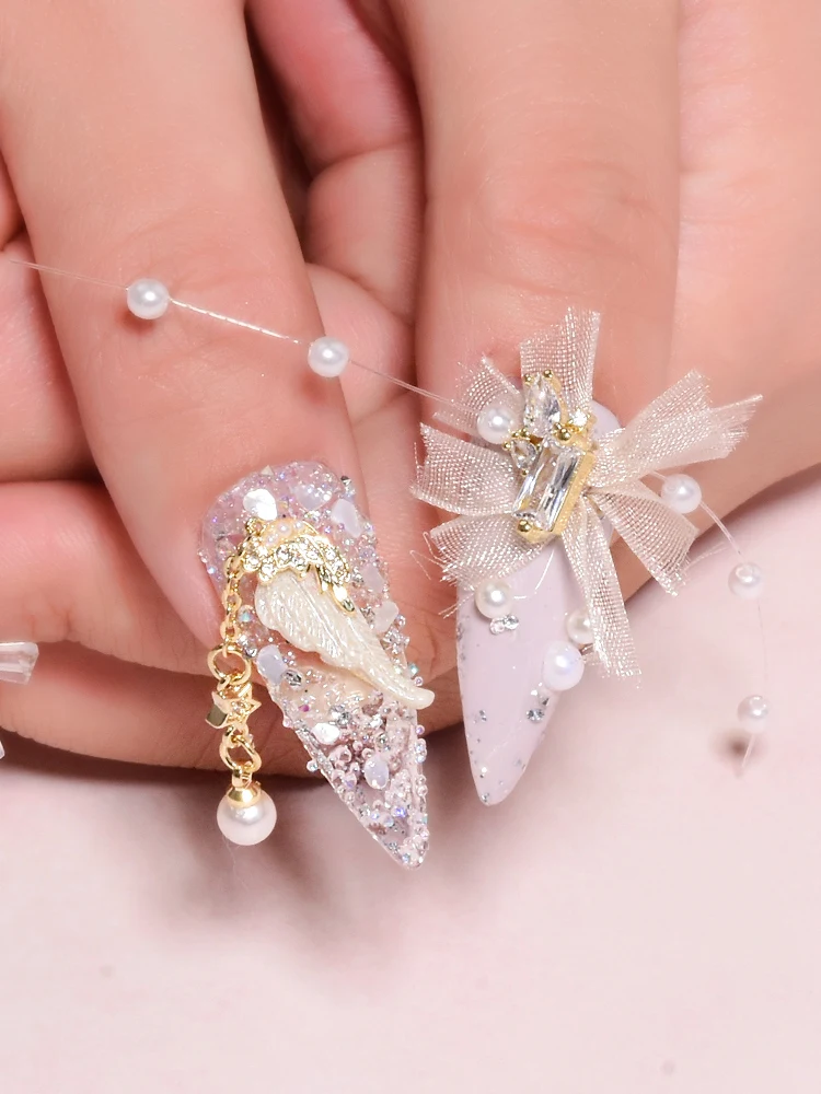 

Latest 10 pieces alloy Zircon Nail art decoration luxury zircon rhinestone tassel / heart / wing nail jewelry high end long nail