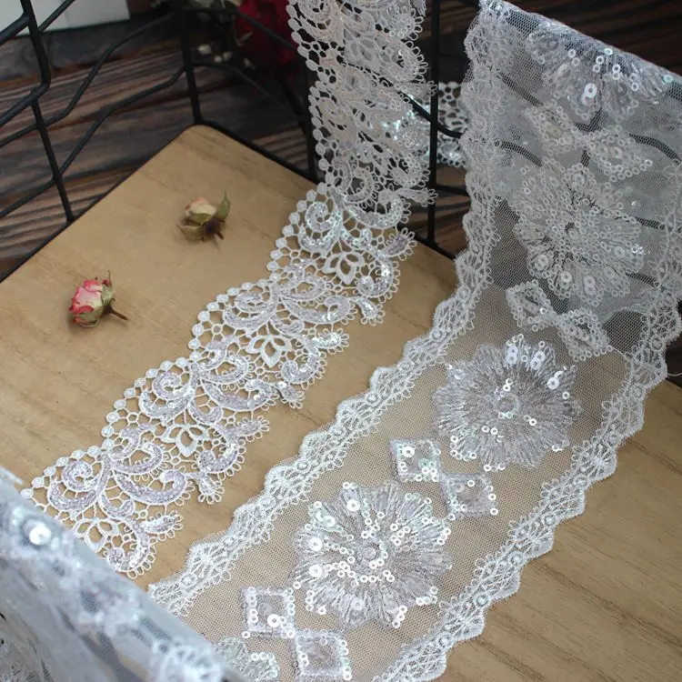 

Silvery Sequins Embroidered Hollow Out Embroidery Lace Trim Ivory Color Min Order 5 Yards High Quality Costume Lace Shiny