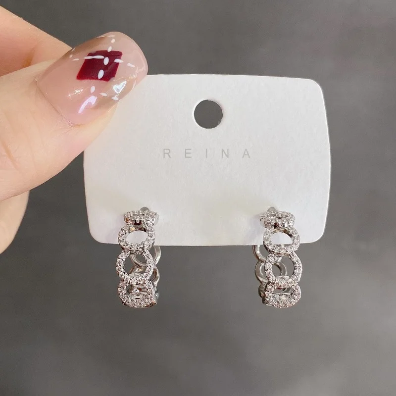

Multi-circle Stitching Hollow Earrings High-quality Niche Circle Zircon Plated Real White Gold Cold Style Accessories