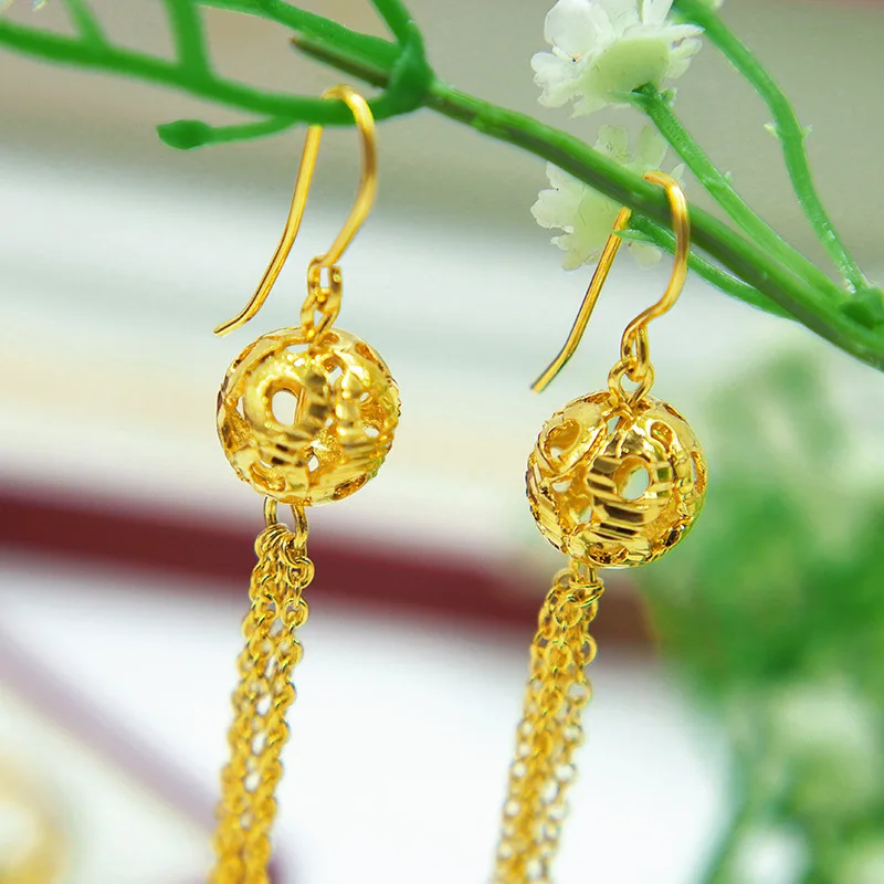 

Корейские серьги-гвоздики из желтого золота с длинными кисточками, 14 к