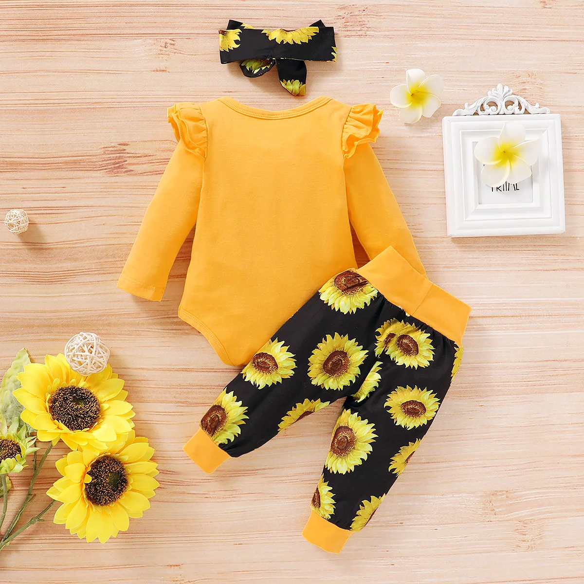 

3Pcs Baby Girl Fall Outfits Long Sleeve Letter Print Ruffle Romper + Elastic Waist Sunflower Pants + Headband Set