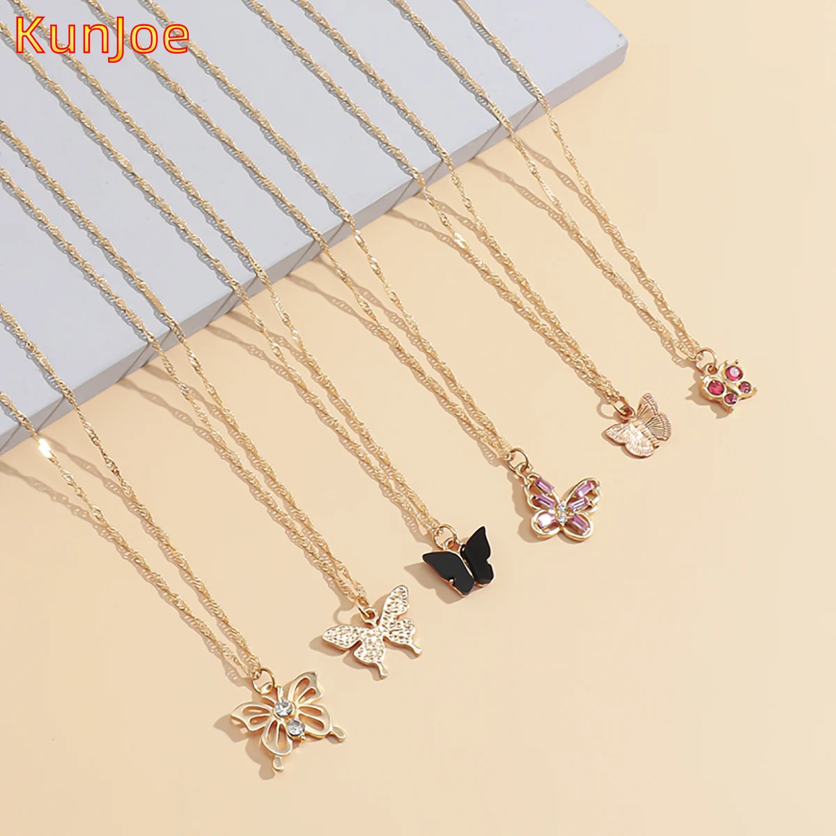 

KunJoe 6pcs/Set Korean Fashion Multilayer Cute Butterfly Pendant Necklace for Women Gold Color Chain Hip Hop Rhinestone Jewelry