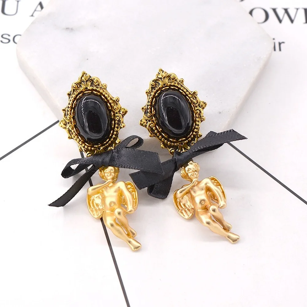 

2021 new European and American ladies party gifts retro jewelry angel pearl earrings personality fashion trend style earrings