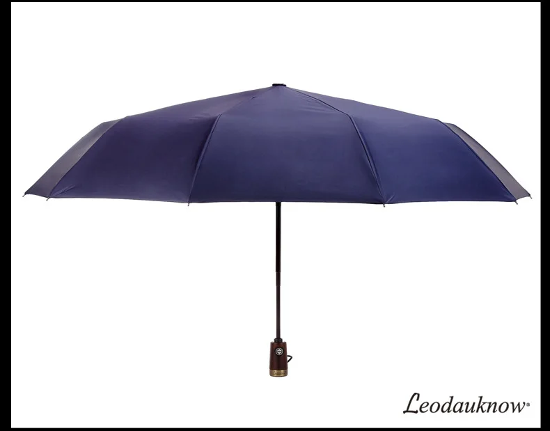 

Full automatic three fold folding business copper handle black glue sunny and rainy gift umbrella