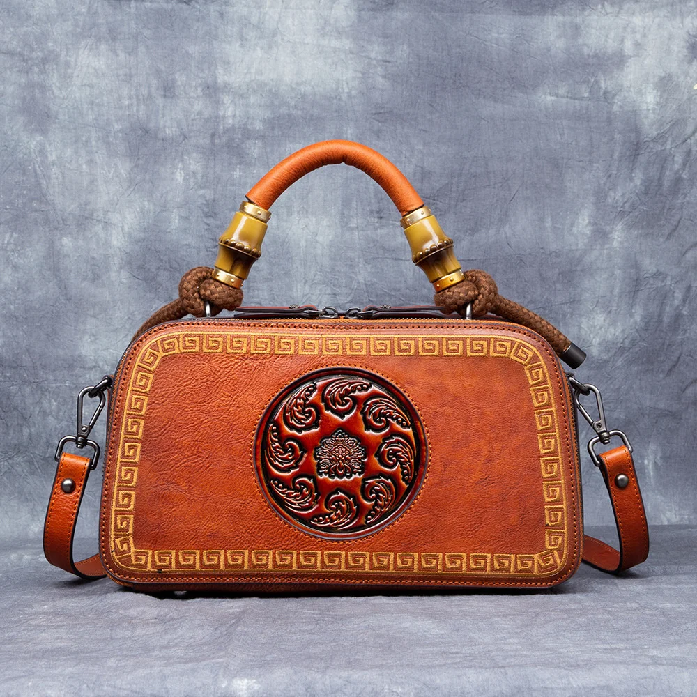 

Straight head leather handbag women's single shoulder messenger bag leather embossed vegetable tanning bag