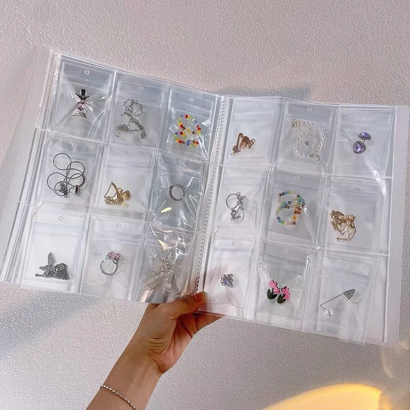

Transparent Jewelry Storage Book with Plasric Pockets Case for Journey Packing Vacation-rings Necklaces Bracelets Earrings