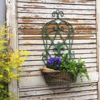 wall metal plant pot stand or vintage wall cachepot for flowers